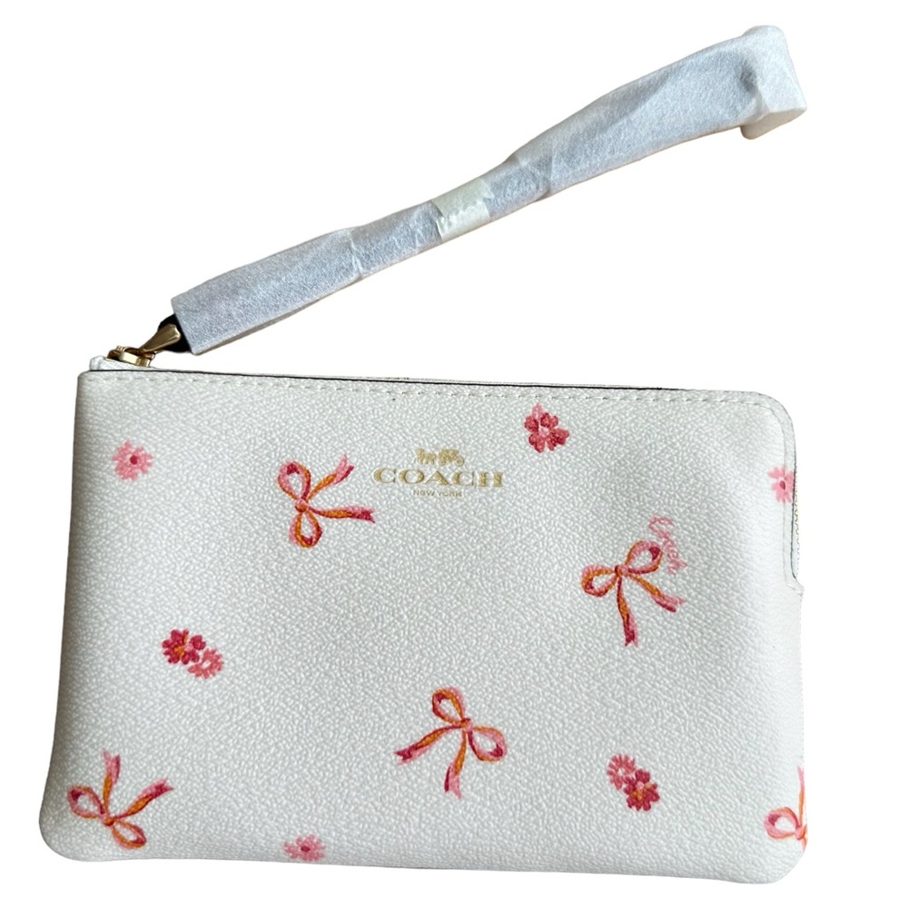 Coach white with bows corner zip wristlet